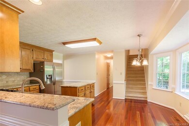 View from family room into kitchen.