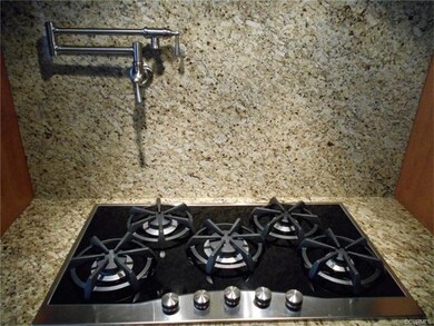 Viking 5-burner gas range, pot-filler faucet