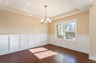 Formal dining room with trey ceiling, and butlers