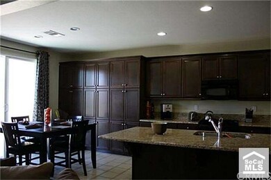 LARGE BREAKFAST ROOM WITH LOTS OF CABINETS