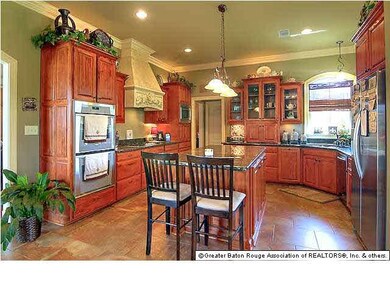 Large kitchen area with sit at bar for two at the 