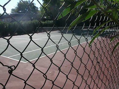 Property Photo. TENNIS COURT