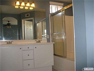Master bath features dual sink vanity and large so