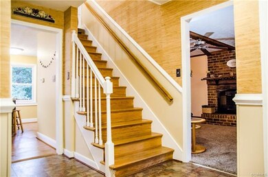 Beautiful wall treatments and hardwood stairs