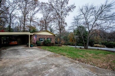 Second driveway with carport