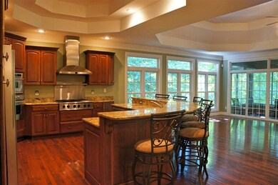 The kitchen features upgraded stainless steel appl