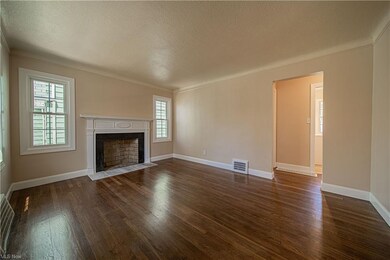 Living room with a peek into the remodeled kitchen