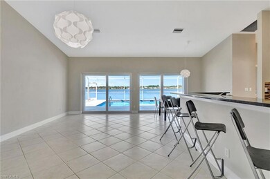 Tiled dining space with a water view