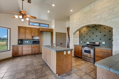 Kitchen featuring appliances with stainless steel