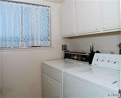 Inside laundry room off kitchen and family room/di
