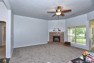 Large living room w/ fireplace to enjoy the upcomi