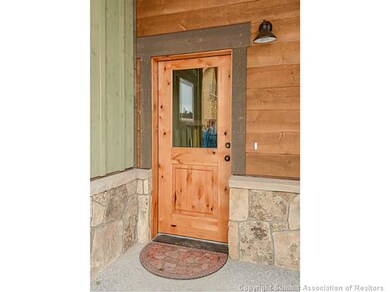 Exterior Front. Knotty Alder front doors