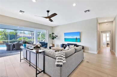 Open to kitchen and outdoor space with disappearin