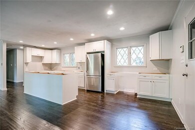 Stainless appliances are featured in the kitchen, 