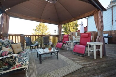 HUGE back deck 34x18.  Overlooks the pool/deck and