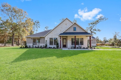 nestled peacefully on an oversized full acre lot