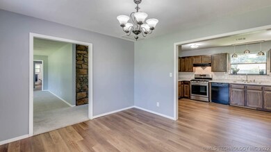 Looking from the dining to kitchen and main living