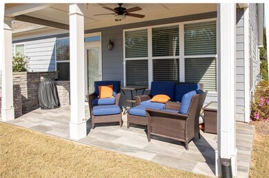 View of patio with a ceiling fan