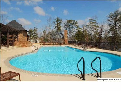 Upscale pool with covered patio areas and outdoor 