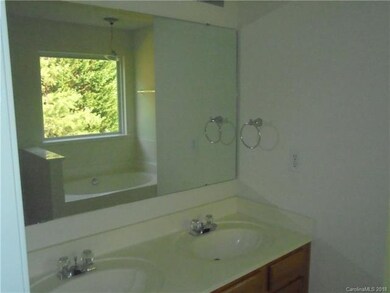 Bright Master Bath offers a Garden Tub, Separate S