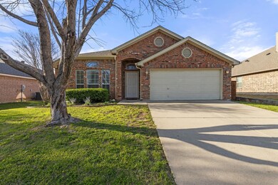 View of front of property with a front yard and a 