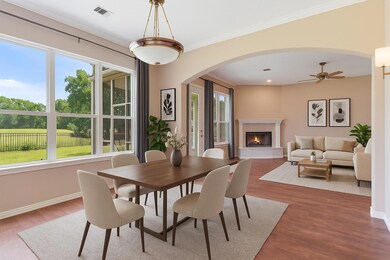 Dining room featuring arched walkways, healthy am