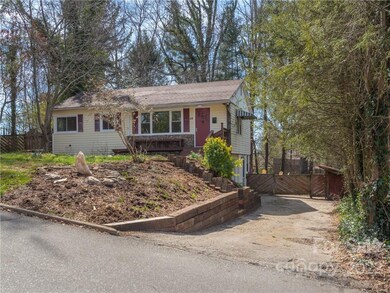 Off Street Parking!  Driveway has a new retaining wall and lots of space.