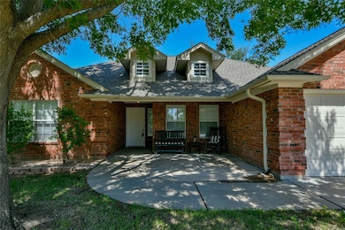 Beautiful home with great shade tree and large front porch area gives a great place to relax and take it easy.