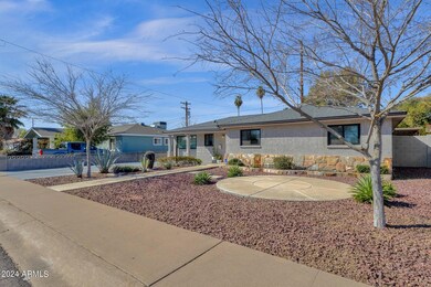 1-web-or-mls-7302-n-23rd-ave