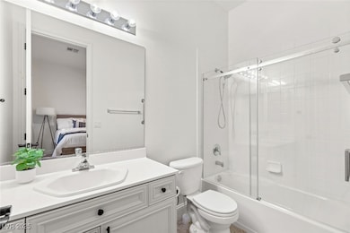 Private full bath for Guest Room #1 with an accessible shower grip