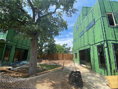 Fenced backyard with a patio area