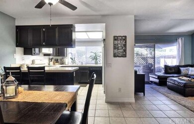 The family room, kitchen, and dining room create a