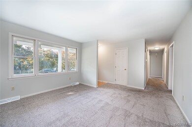 Spare room with light carpet