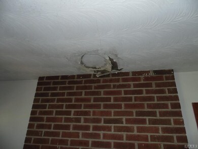 LIVING ROOM CEILING DAMAGE