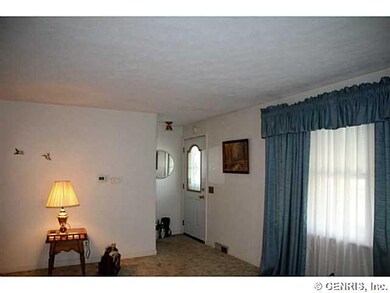 Living Room. looking toward the front door.  Hardw