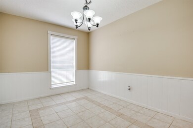 Clean, shiplap chair rails add dimension to this space.