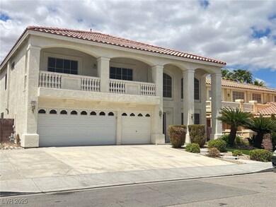 Mediterranean / spanish-style home featuring a til