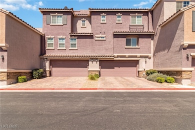 View of front of property with driveway, an attach