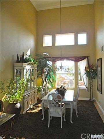 Formal Dining Room with Cathedral Ceiling