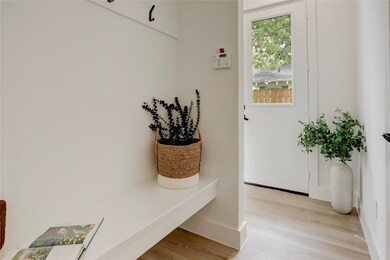 Upon entering there is a convenient mud room with