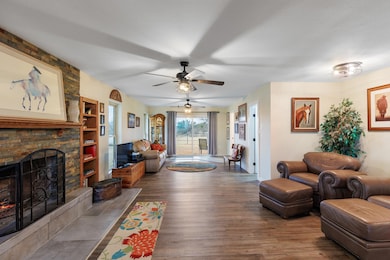 Living room featuring wood finished floors, ceili