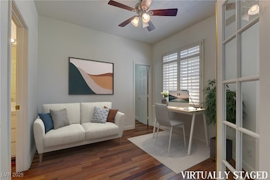 Virtually Staged;
Office with wood finished floor