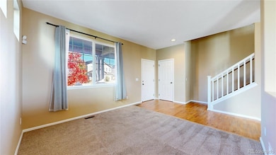 Bright and open receiving room. Could be used as a home office space.