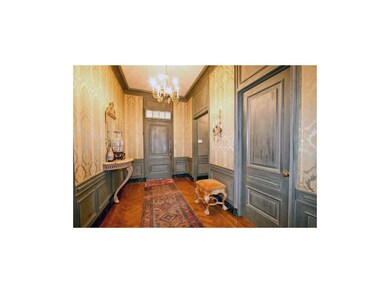 Front Entry with Herringbone Pattern Wood Floor