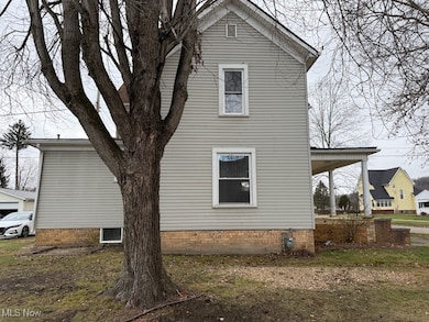 214 W 7th St, Uhrichsville, OH 44683 - photo 2