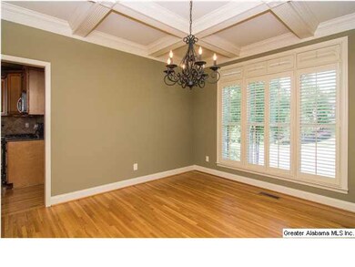 Banquet-sized dining room with coffered ceiling, h