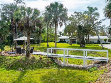 Front yard features a private sitting area