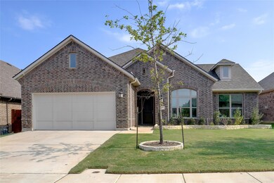 View of front of property featuring a front lawn a