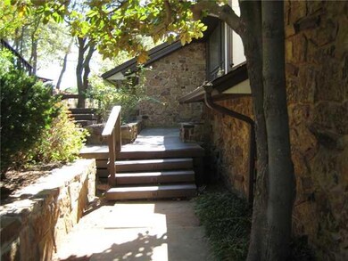 Exterior Front. The stone is accented by lovely la