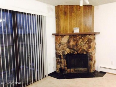 Living Room W/ Wood Burning Fireplace